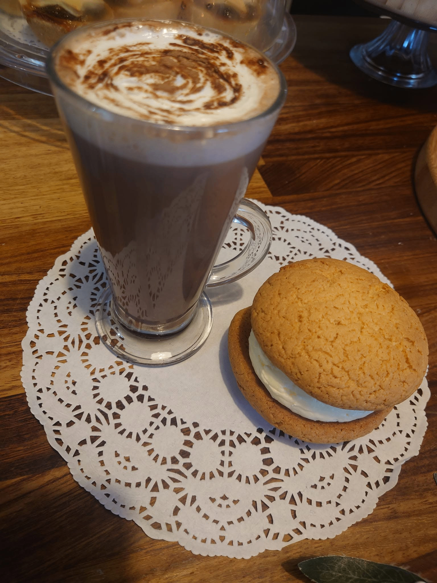 Hot chocolate served with a sweet treat at Gatehouse Cafe